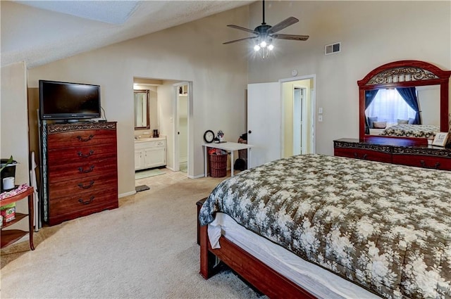 bedroom featuring visible vents, light colored carpet, high vaulted ceiling, and a ceiling fan