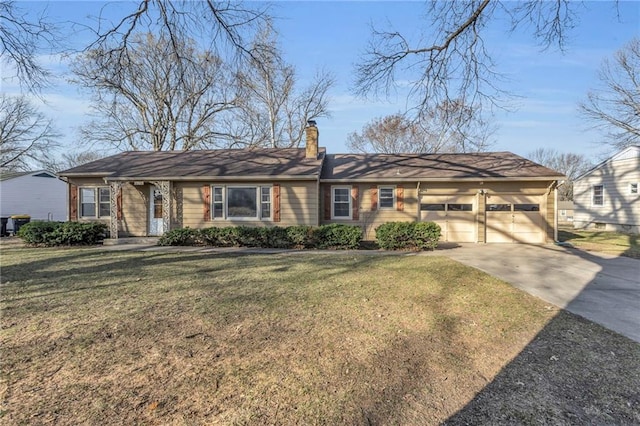 ranch-style home featuring a garage, a chimney, concrete driveway, and a front lawn