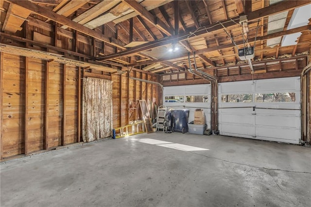 garage featuring a garage door opener