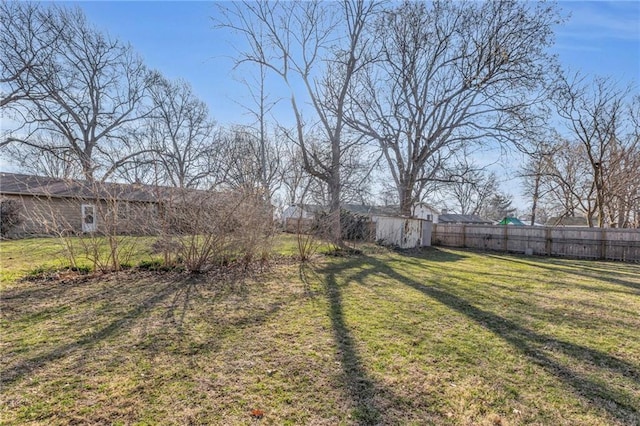 view of yard with fence