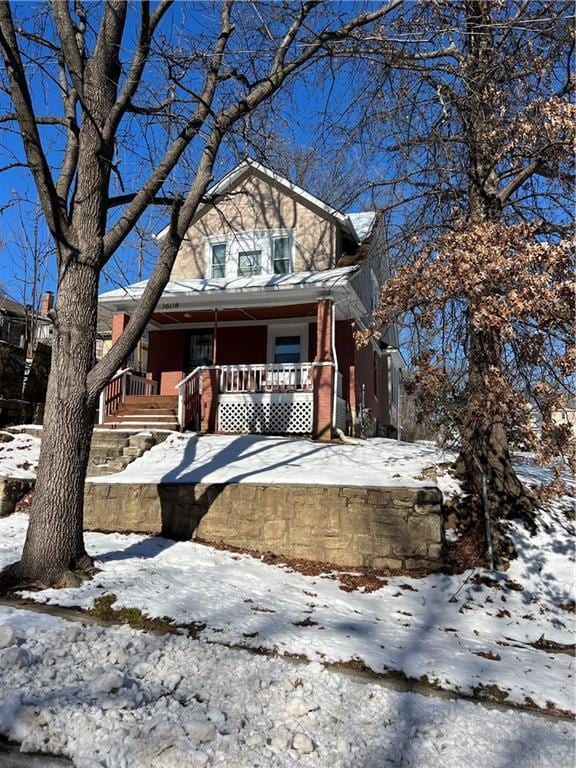 view of front of home featuring covered porch