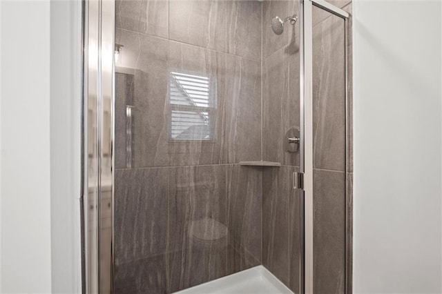 full bathroom with a stall shower