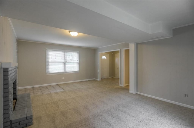 unfurnished living room featuring light carpet, crown molding, and baseboards