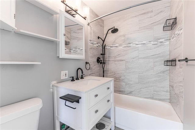 full bathroom with bathtub / shower combination, toilet, and vanity