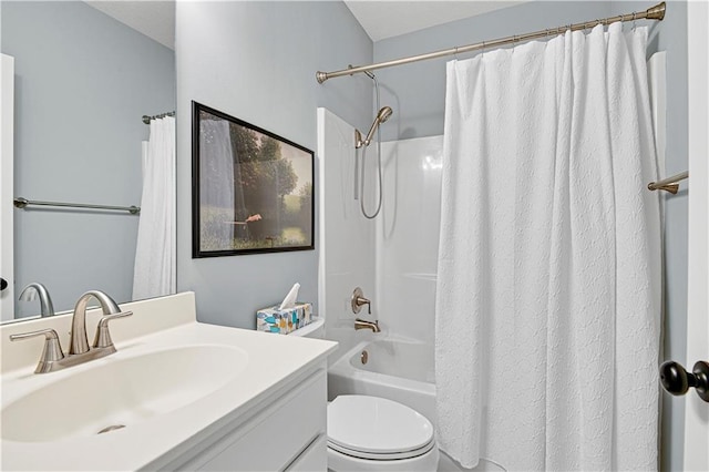 bathroom with vanity, toilet, and shower / bathtub combination with curtain