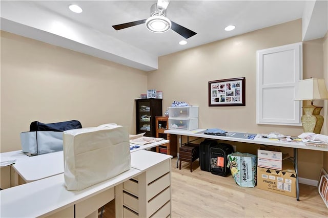 office area featuring light wood finished floors, recessed lighting, and a ceiling fan