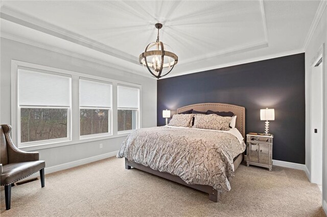 12745 N Larkspur Ln, Platte City, MO 64079 - bedroom with light colored carpet, ornamental molding, a chandelier, and a raised ceiling