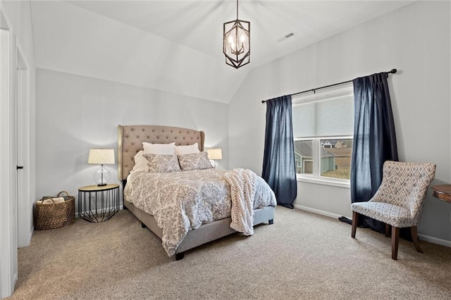 12745 N Larkspur Ln, Platte City, MO 64079 - carpeted bedroom featuring visible vents, vaulted ceiling, baseboards, and a notable chandelier