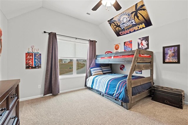 12745 N Larkspur Ln, Platte City, MO 64079 - carpeted bedroom with lofted ceiling, a ceiling fan, baseboards, and visible vents