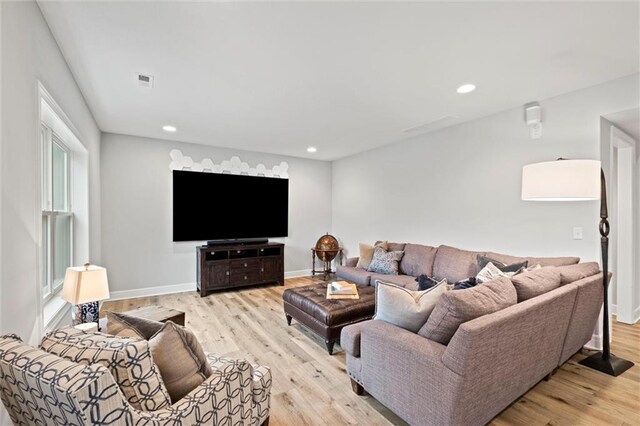 12745 N Larkspur Ln, Platte City, MO 64079 - living room featuring baseboards, visible vents, light wood finished floors, and recessed lighting