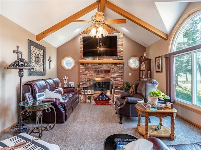 carpeted living room with beamed ceiling, high vaulted ceiling, a ceiling fan, a fireplace, and baseboards