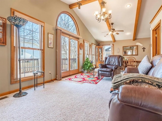 living area featuring beam ceiling, ceiling fan with notable chandelier, baseboards, and carpet floors