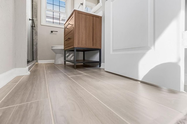 interior space featuring baseboards