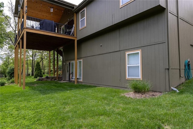8755 N Chatham Ave, Kansas City, MO 64154 - view of home's exterior featuring a lawn and a balcony