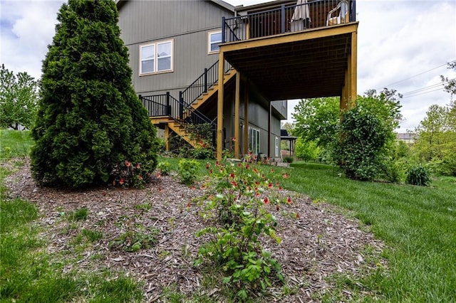 8755 N Chatham Ave, Kansas City, MO 64154 - back of property featuring stairway and a deck