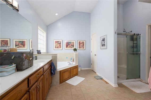 8755 N Chatham Ave, Kansas City, MO 64154 - full bath with a stall shower, a bath, vanity, tile patterned floors, and high vaulted ceiling