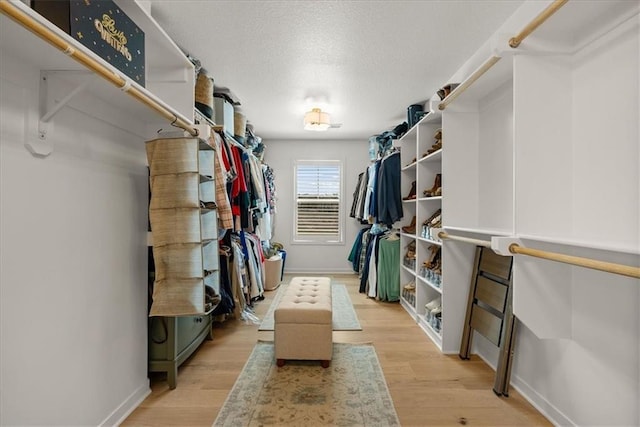 9010 N Denver Ave, Kansas City, MO 64156 - spacious closet with light wood finished floors