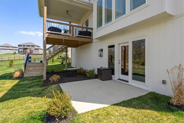 9010 N Denver Ave, Kansas City, MO 64156 - view of patio / terrace with stairway, a wooden deck, and fence