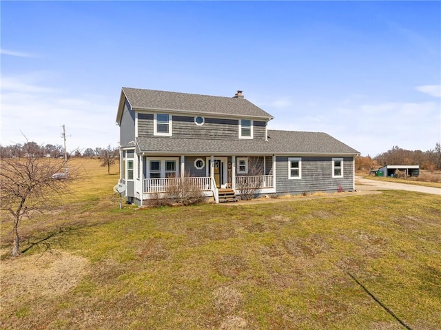 view of front of house featuring a front yard, a porch, a chimney, and roof with shingles