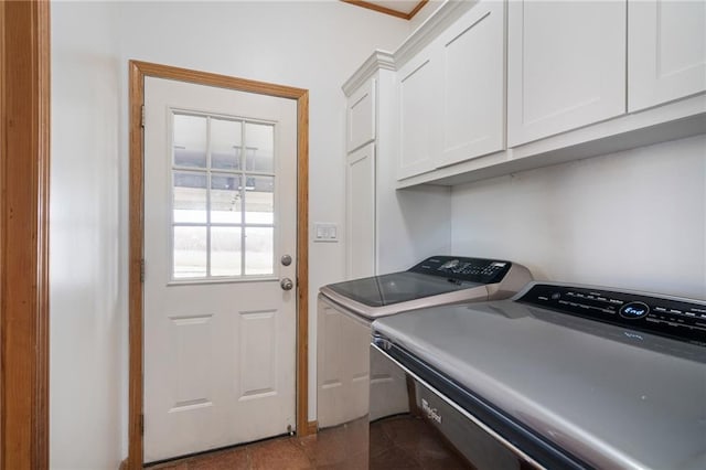 laundry room with cabinet space and independent washer and dryer