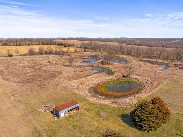 bird's eye view featuring a rural view and a water view