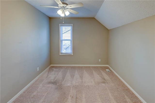 bonus room with visible vents, a ceiling fan, a textured ceiling, carpet, and baseboards