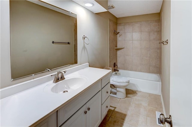 bathroom featuring tile patterned floors, visible vents, toilet, washtub / shower combination, and vanity