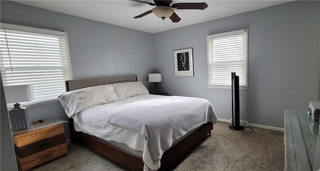 bedroom with baseboards, carpet, and ceiling fan