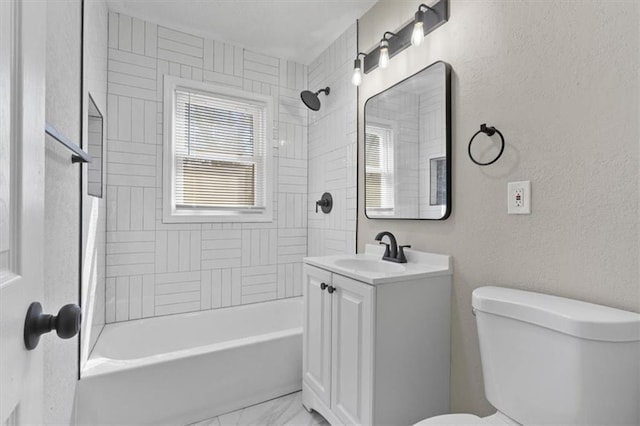 3403 Norton Ave, Kansas City, MO 64128 - bathroom featuring a healthy amount of sunlight, toilet, vanity, and a textured wall