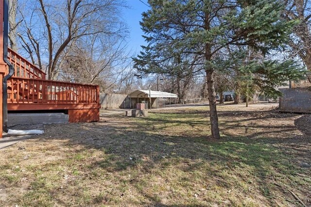 3403 Norton Ave, Kansas City, MO 64128 - view of yard featuring a deck