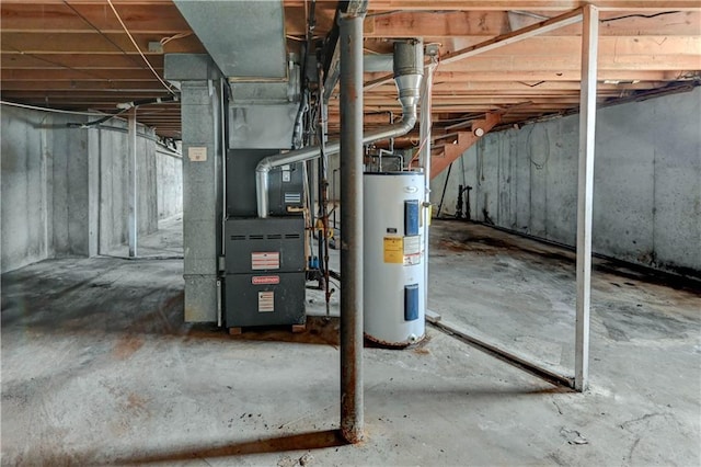 unfinished below grade area with heating unit and electric water heater