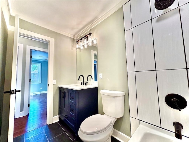 full bathroom featuring toilet, wood finished floors, crown molding, baseboards, and vanity