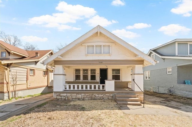 bungalow-style home with covered porch