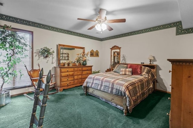 bedroom with carpet flooring, ceiling fan, visible vents, and baseboards
