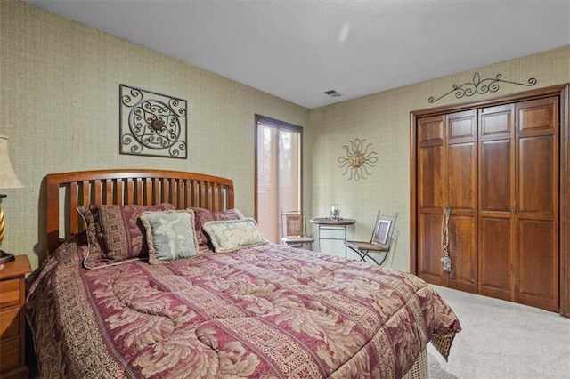carpeted bedroom with visible vents