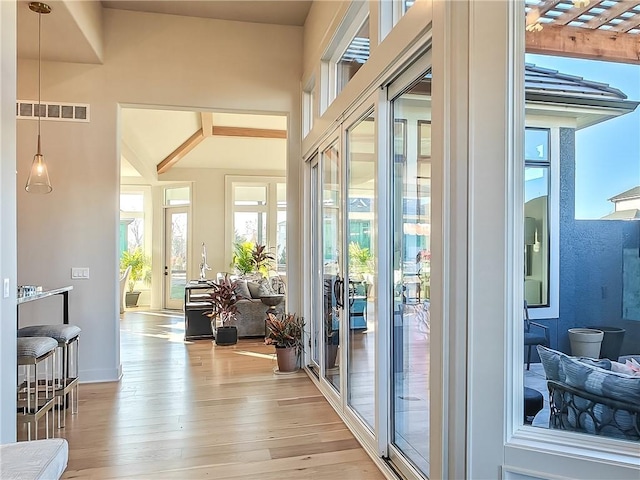 doorway with visible vents and light wood-style flooring