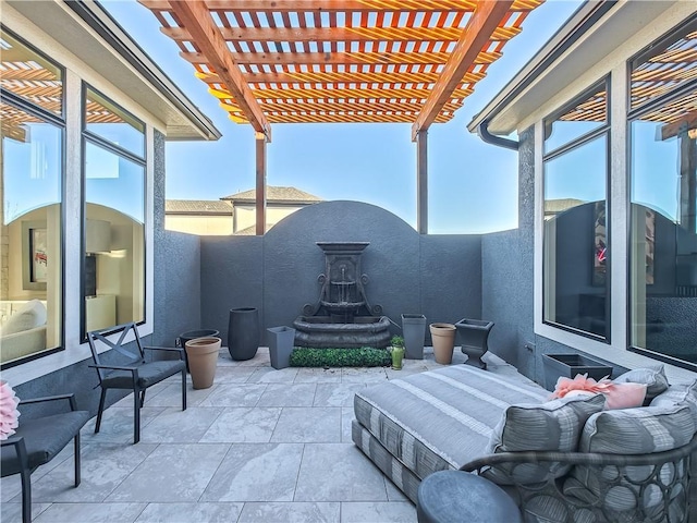 view of patio featuring a pergola