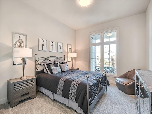 bedroom with baseboards and carpet flooring