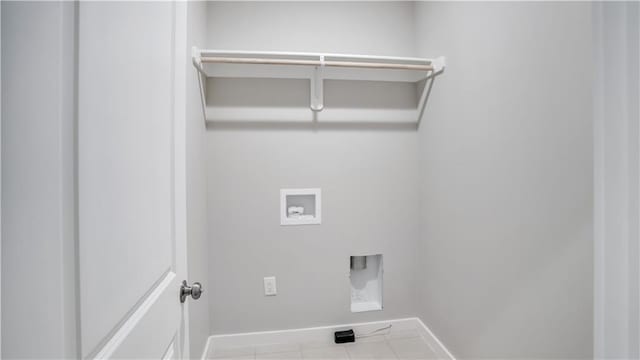 laundry area with baseboards, washer hookup, hookup for an electric dryer, and tile patterned floors