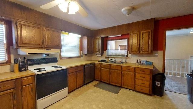 kitchen featuring brown cabinetry, a sink, range with electric stovetop, stainless steel dishwasher, and exhaust hood