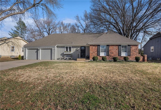 single story home with a front yard, brick siding, concrete driveway, and an attached garage