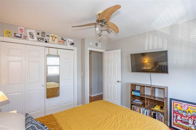 bedroom featuring a closet and ceiling fan