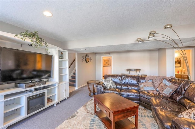 21212 E 52nd Street Ct, Blue Springs, MO 64015 - carpeted living room featuring baseboards, stairs, and a textured ceiling
