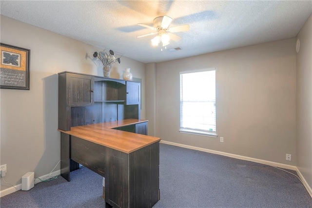 21212 E 52nd Street Ct, Blue Springs, MO 64015 - unfurnished office featuring dark colored carpet, a textured ceiling, and baseboards