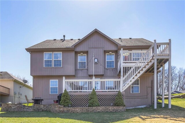 21212 E 52nd Street Ct, Blue Springs, MO 64015 - rear view of property featuring a wooden deck, a yard, and stairs