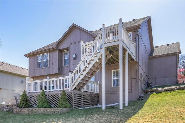 21212 E 52nd Street Ct, Blue Springs, MO 64015 - back of property with a wooden deck, a yard, a shingled roof, and stairway