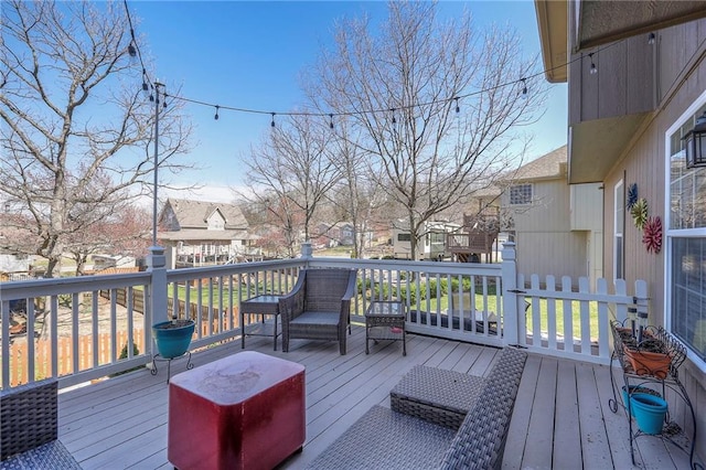 21212 E 52nd Street Ct, Blue Springs, MO 64015 - wooden deck with a residential view