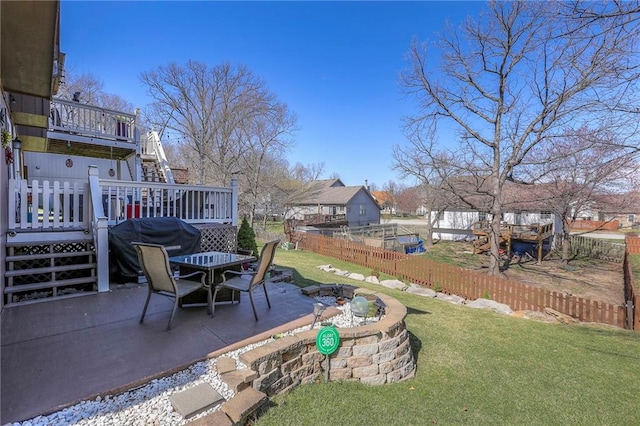 21212 E 52nd Street Ct, Blue Springs, MO 64015 - view of yard with fence, a patio area, and a wooden deck