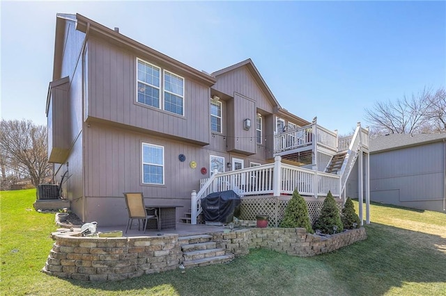 21212 E 52nd Street Ct, Blue Springs, MO 64015 - back of house with a lawn, a patio, and a deck