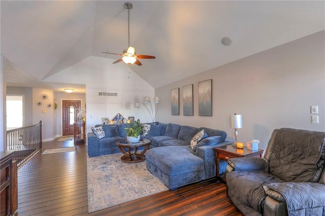 21212 E 52nd Street Ct, Blue Springs, MO 64015 - living room with dark wood finished floors, baseboards, visible vents, a ceiling fan, and high vaulted ceiling